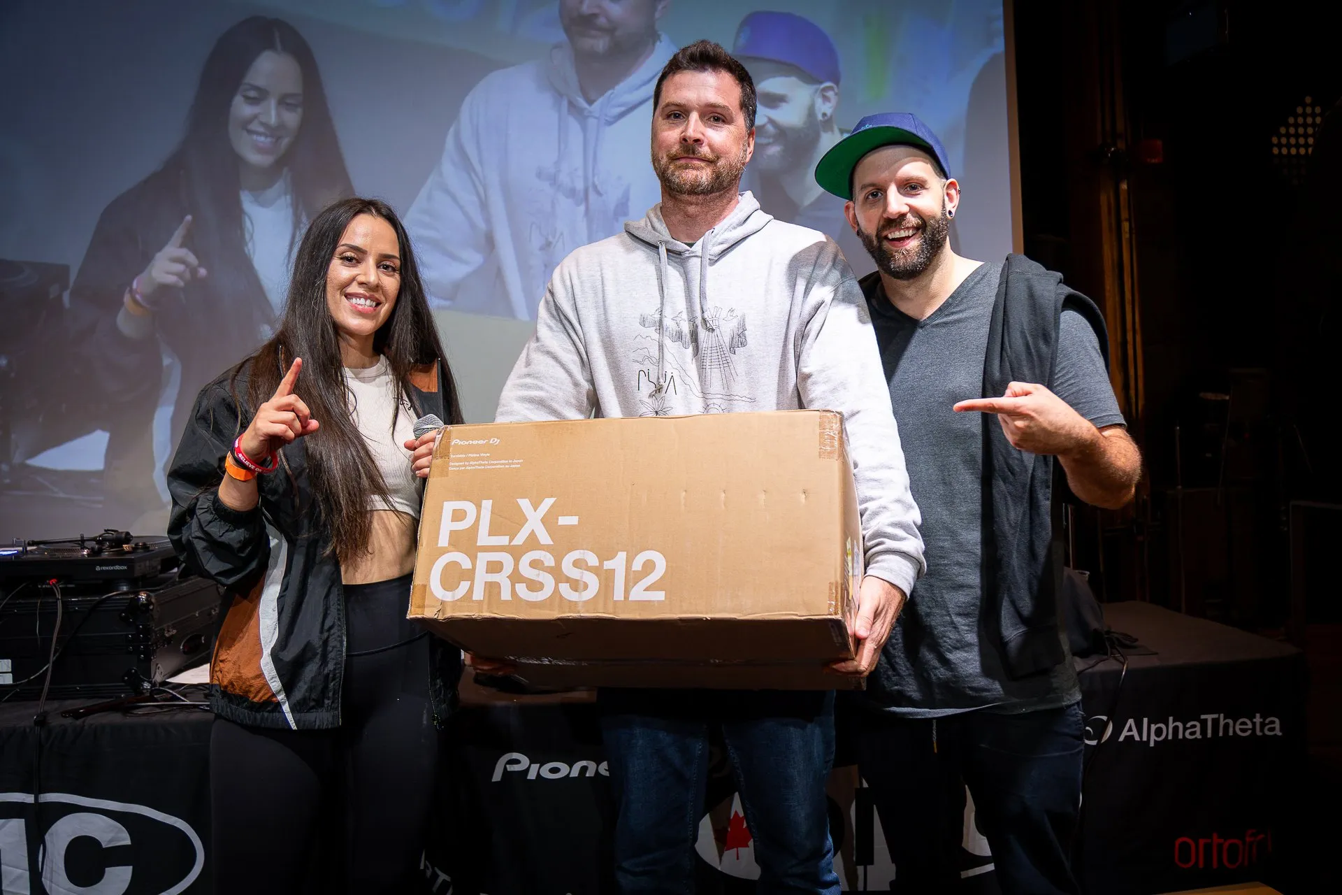 DEEJAY T-JR. presenting a Pioneer DJ PLX-CRSS12 turntable as a prize at the 2026 DMC Canadian DJ Championships.